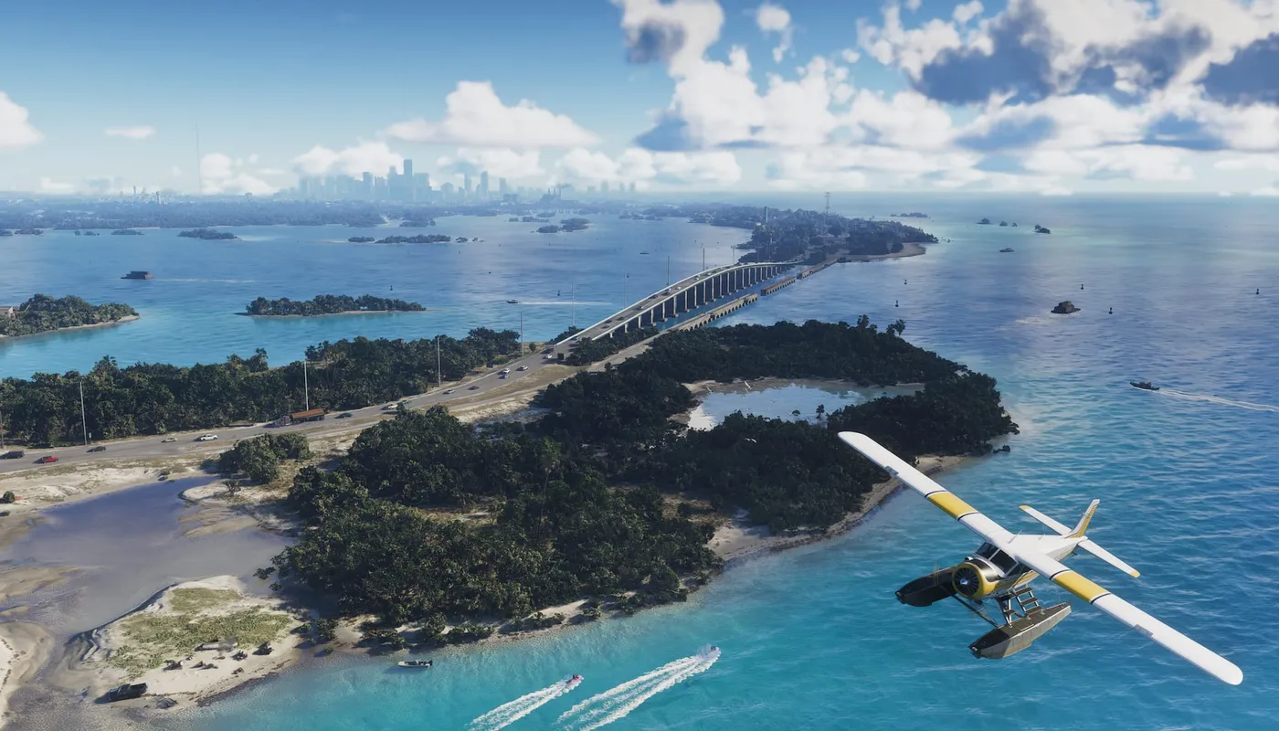 Captură din GTA VI: Leonida Keys din aer, cu un pod lung peste apa turcoaz, insule, un hidroavion și bărci